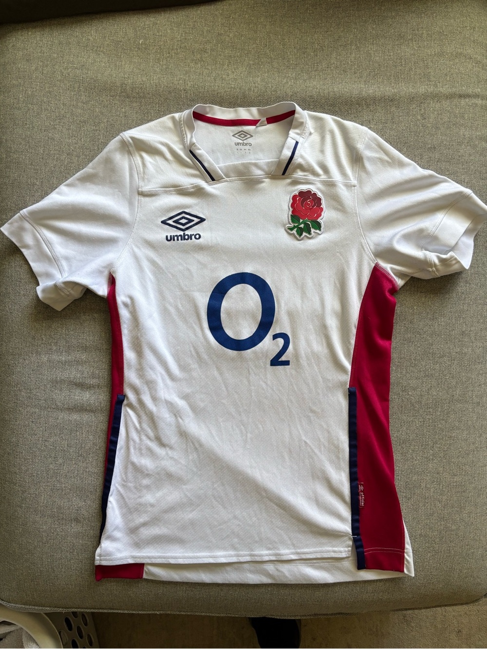 Umbro White Rugby Jersey with Red Panels and Blue Sponsor Logo